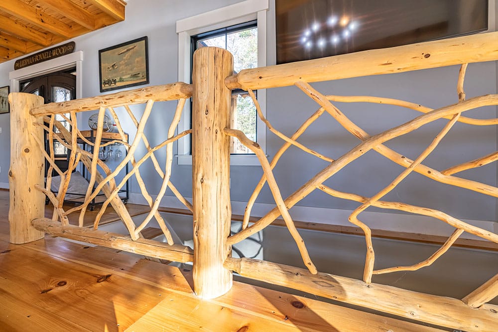 Cabin interior with custom wooden fence