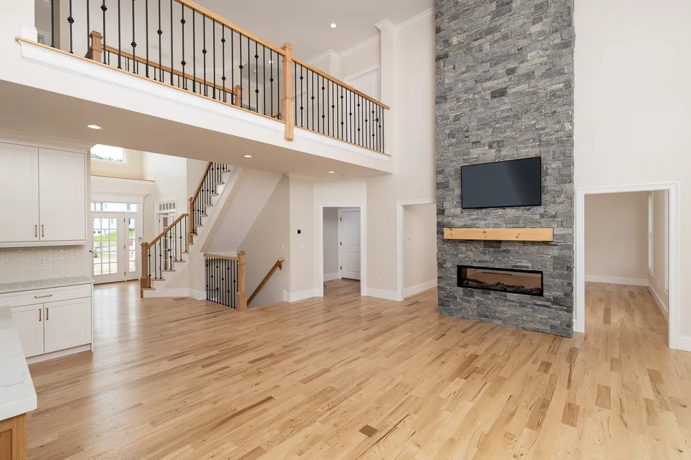 5 Steven Circle, Farmington. 2 Story family room w. See throough fireplace & decorative stone facade & 2nd level balcony