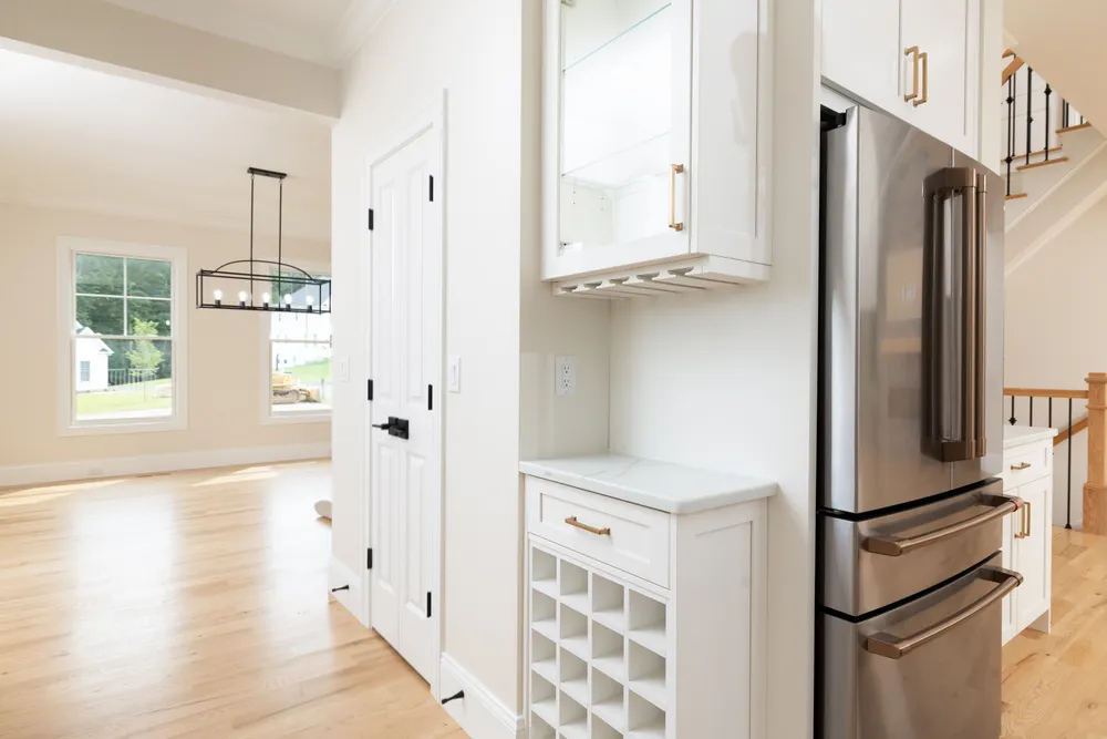 5 Steven Circle, Farmington. Built-In wine bar w. glass storage & glass shelving