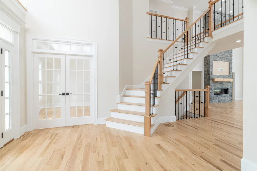 5 Steven Circle, Farmington. Custom main angled stairwell featuring decorative metal spindles & oak banisters