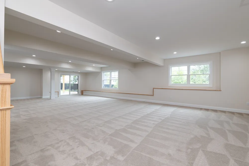 5 Steven Circle, Farmington. Lower level oversized sunlit family room w. access to patio