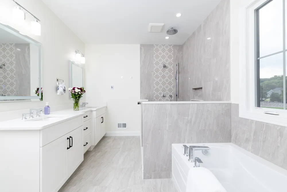 5 Steven Circle, Farmington. Primary Bath w. Ample double sinks w. custom lit mirrors & oversized walk-in tile shower w. rain shower & soaking tub