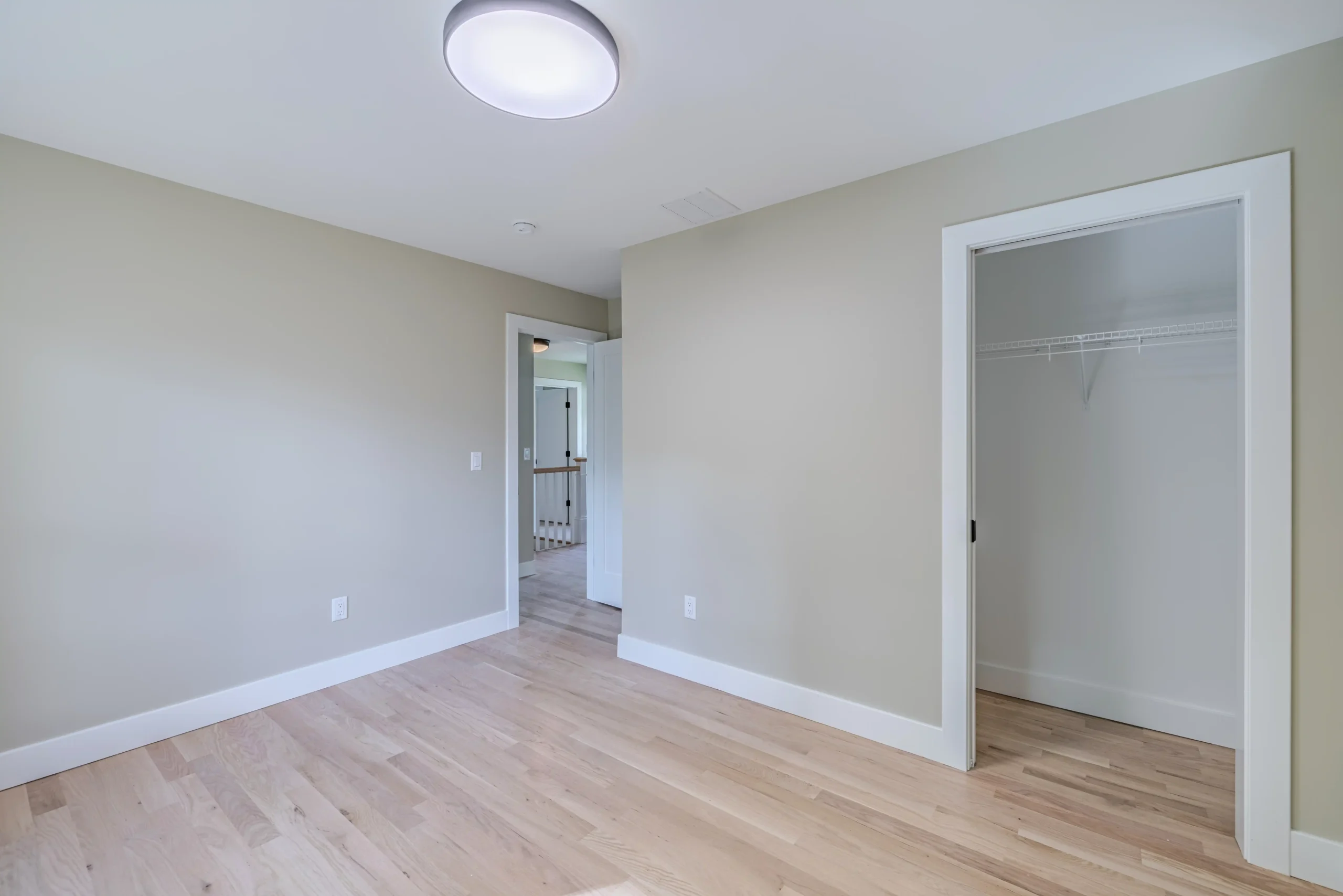 Crystal Lake Home 5 Elm Street Unfurnished bedroom with neutral walls, ceiling light and white interior doors