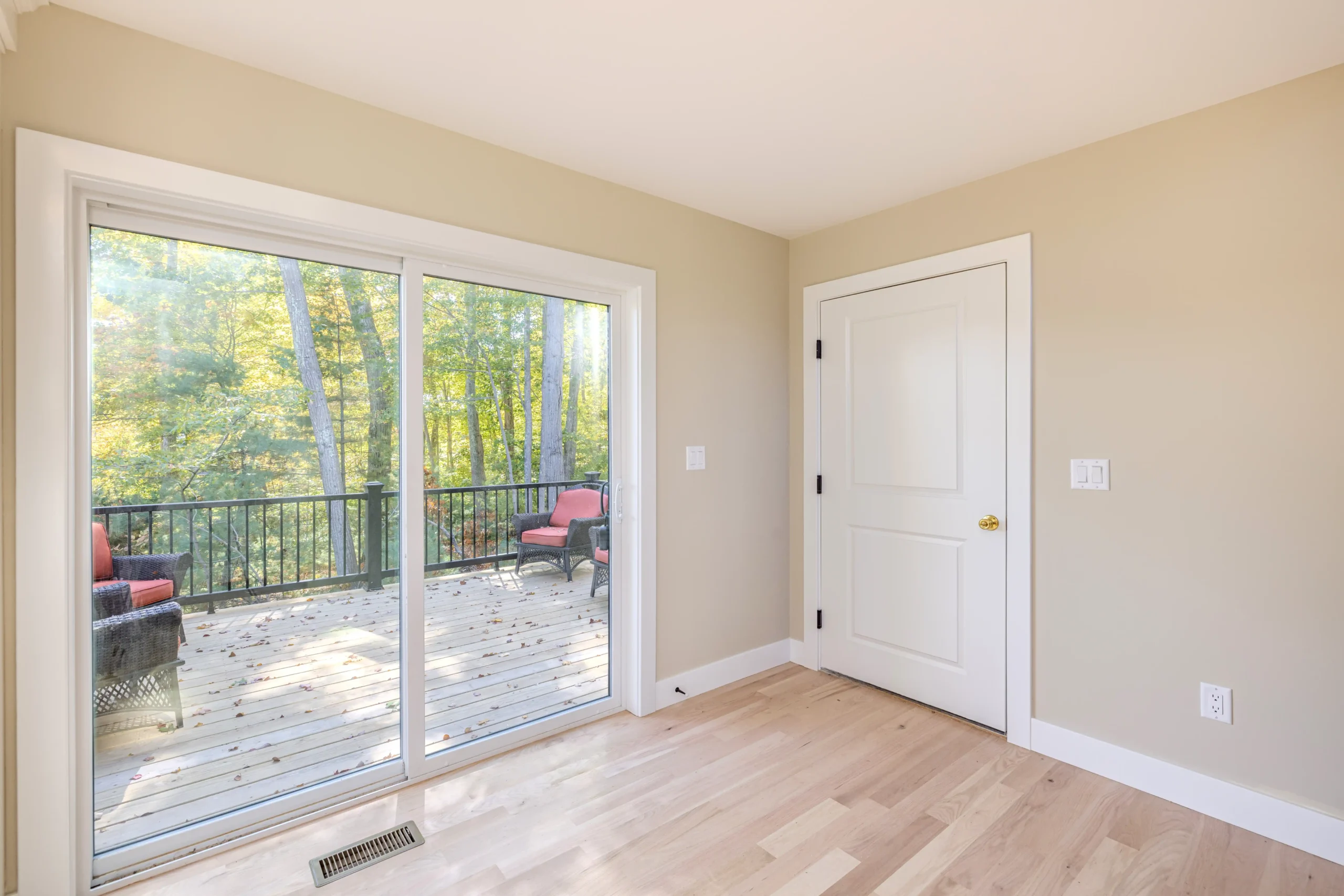 Crystal Lake Home 5 Elm Street Bright Bright interior space with sliding glass doors opening to an outdoor deck