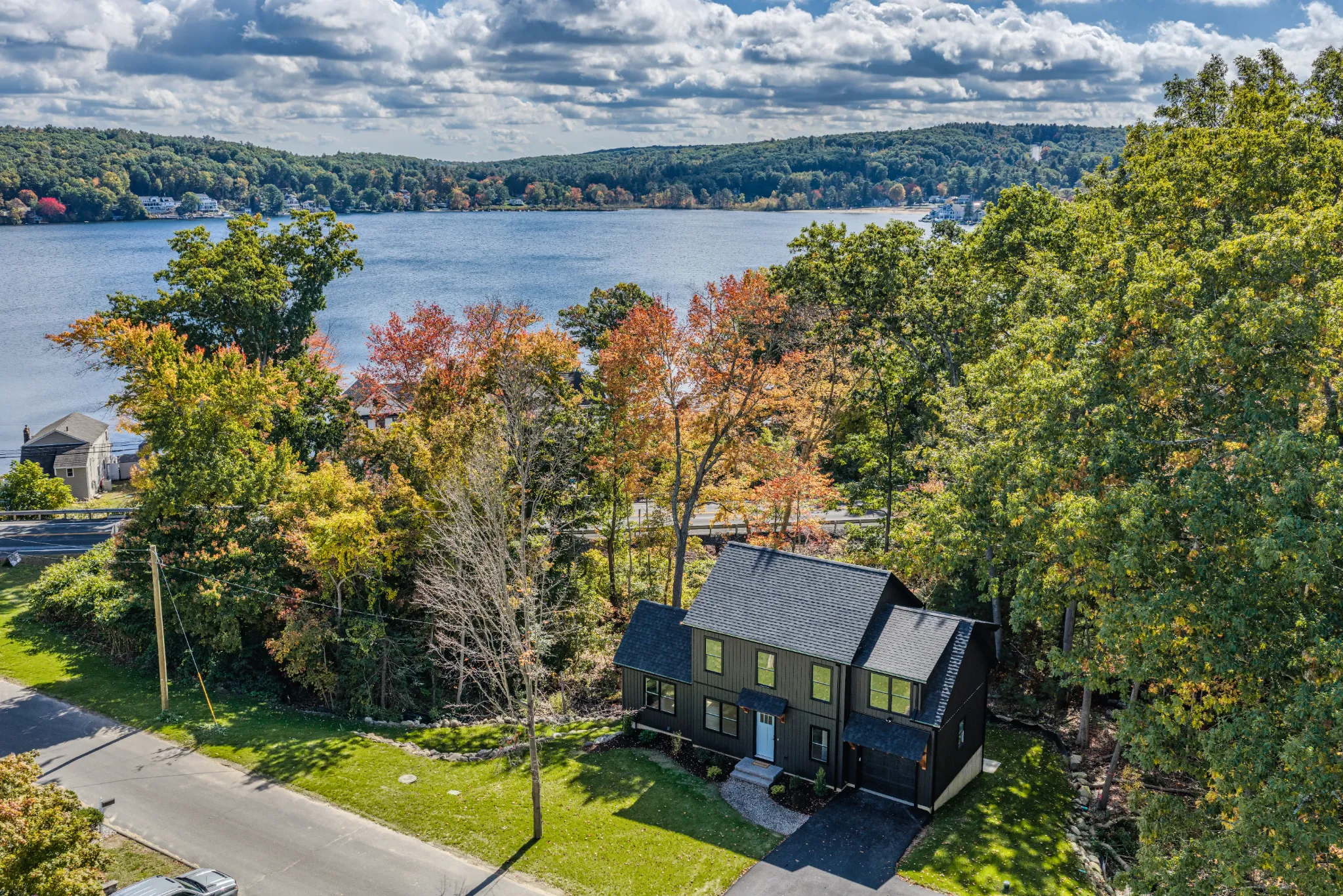 Crystal Lake Home 5 Elm Street Scenic view of Crystal Lake with fall foliage and distant shoreline